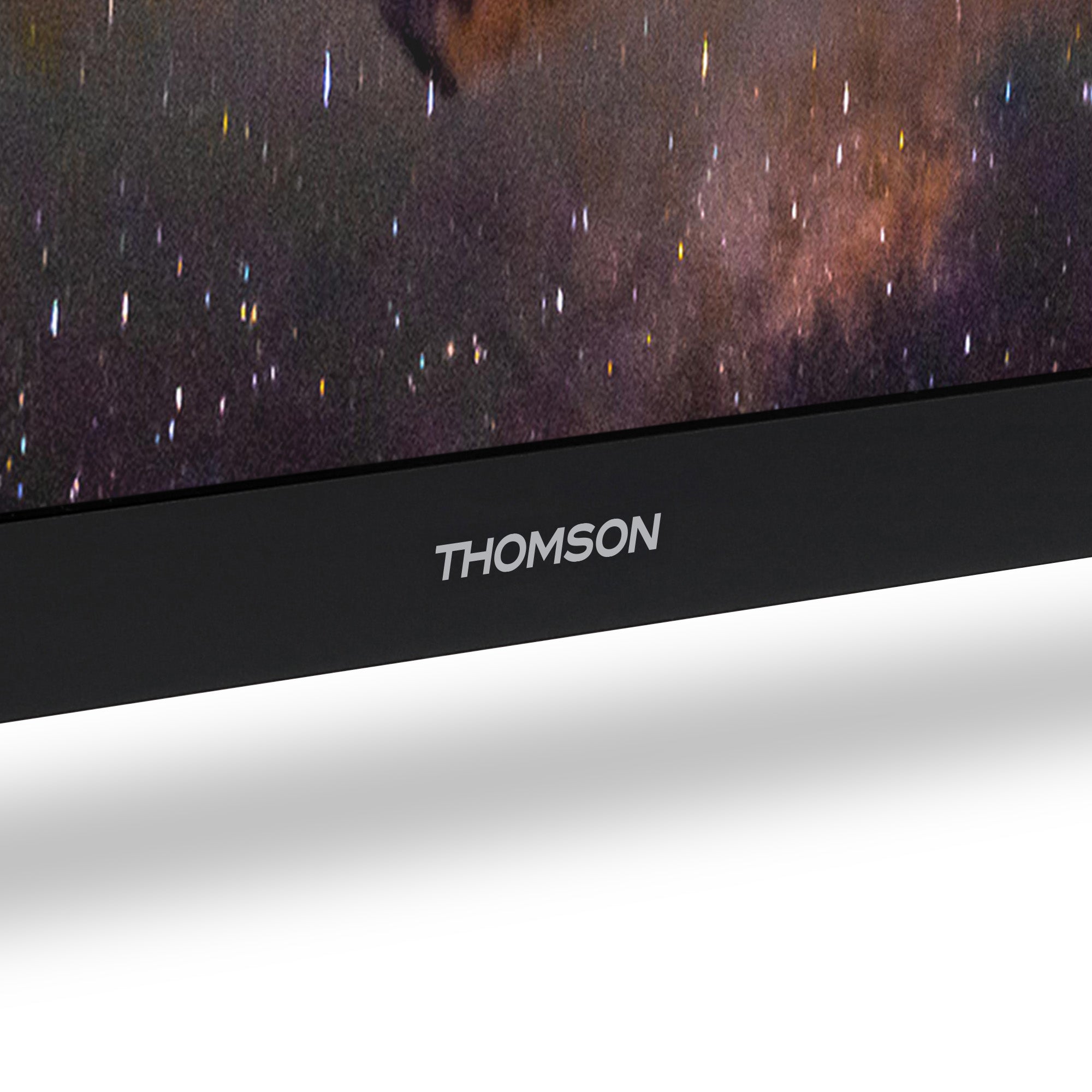 Close-up of a Thomson television screen with a starry space background.