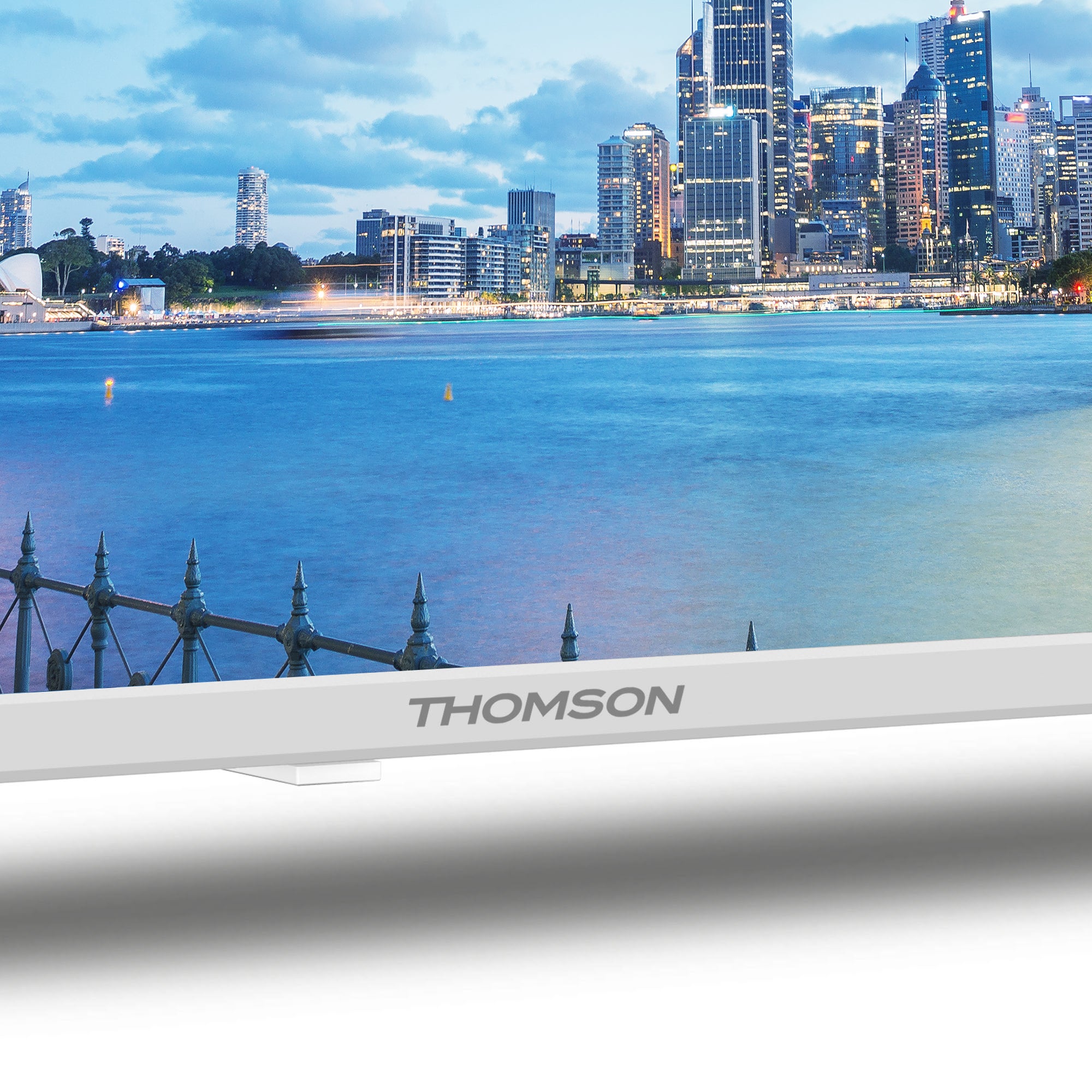Thomson TV with city skyline and waterfront in the background
