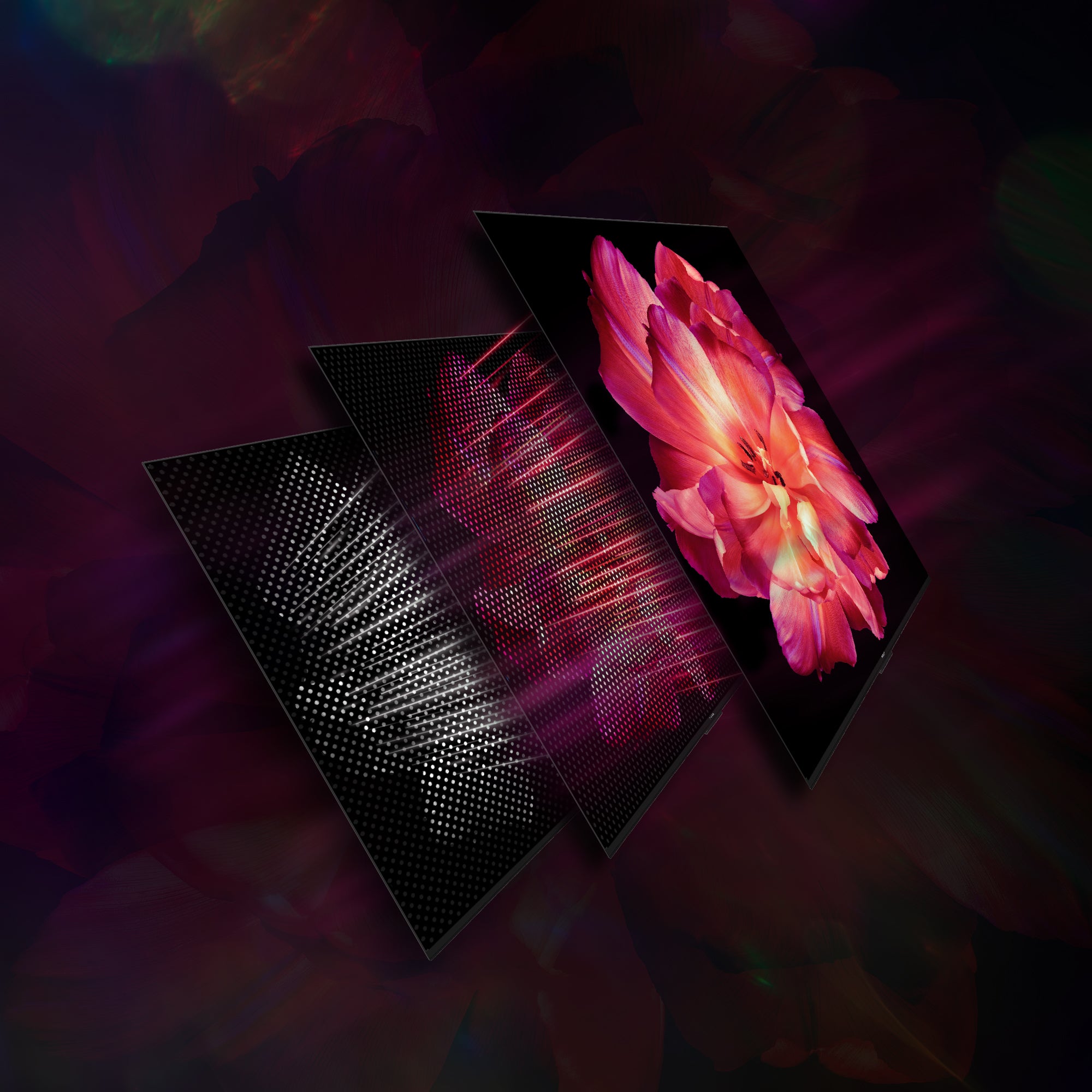 Three electronic displays showing different abstract designs on a dark background