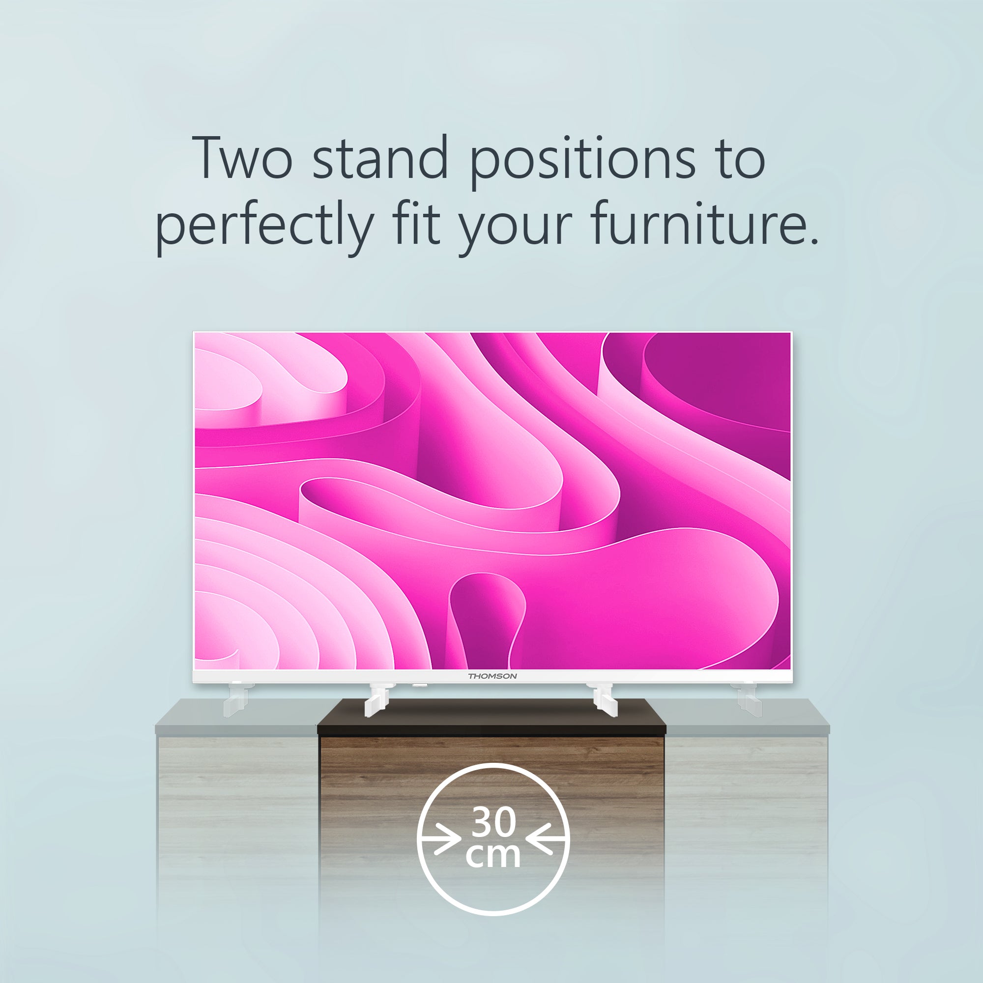 Smart TV on a stand with a pink abstract screen fill design on the screen, against a light blue background.